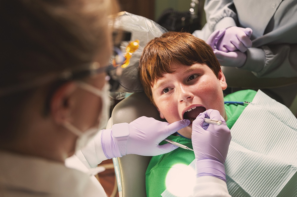 Dentist Cleaning Childs Teeth