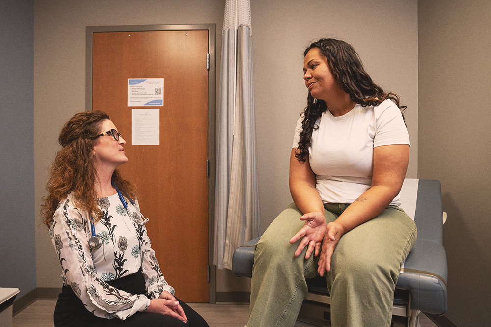 Doctor with Patient Sitting
